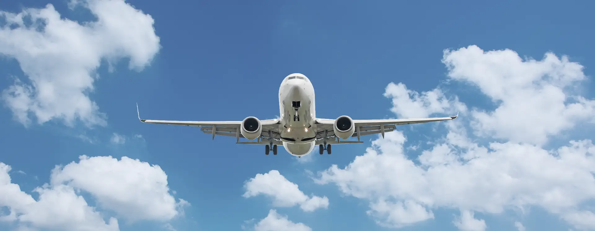 Airplane in a bright sky